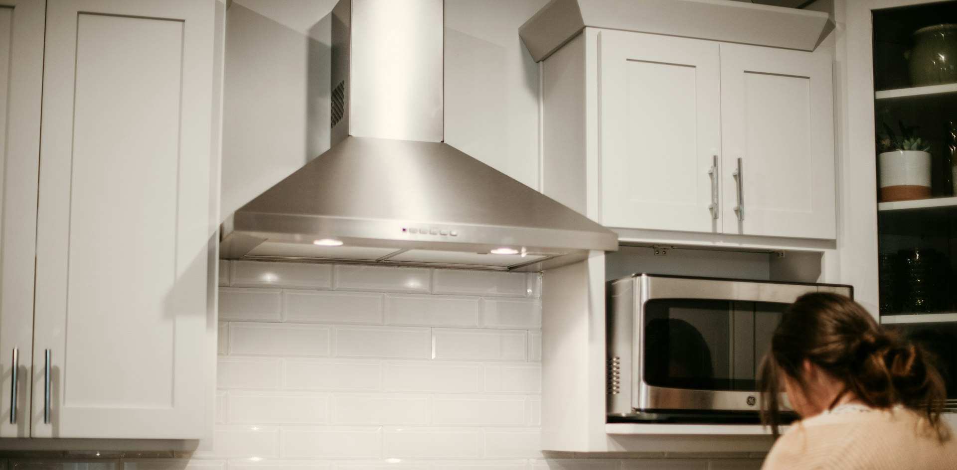 Microwave on shleft in wall unit cupboard Microwave on shleft in wall unit cupboard